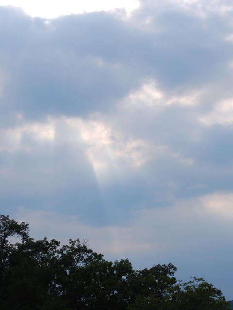 Light Shines through a Cloudy Horizon