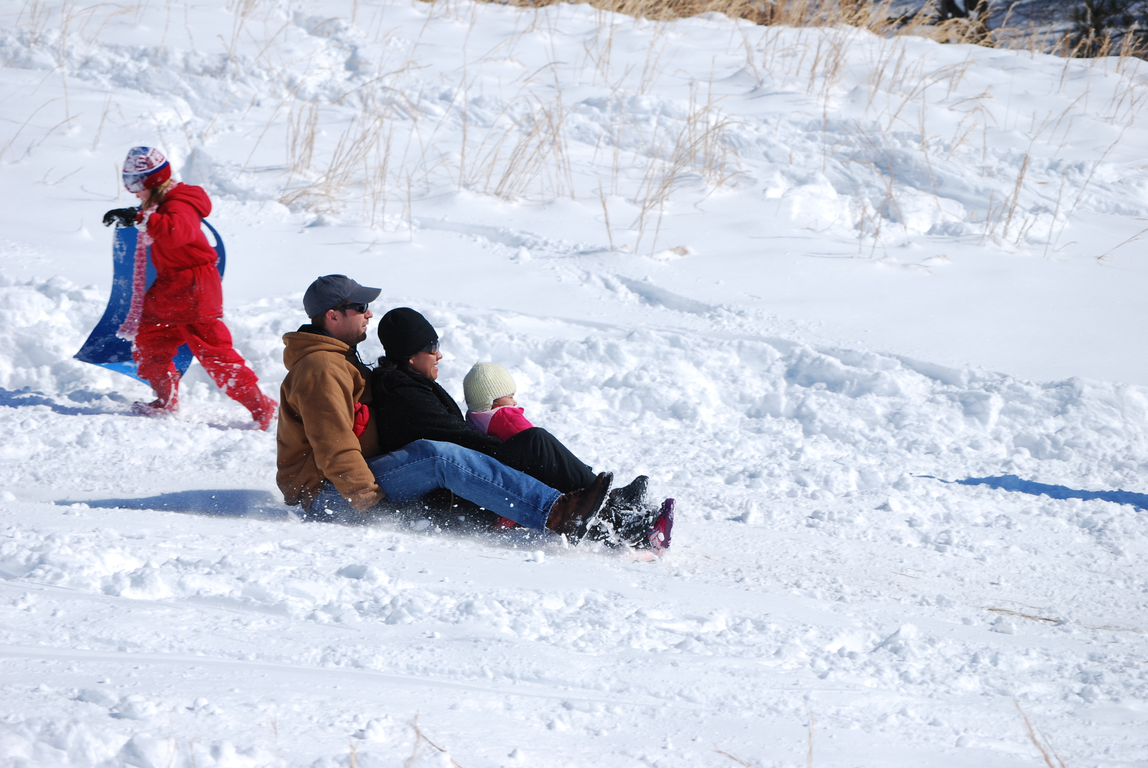 Sledding can be a family event. Storytellers